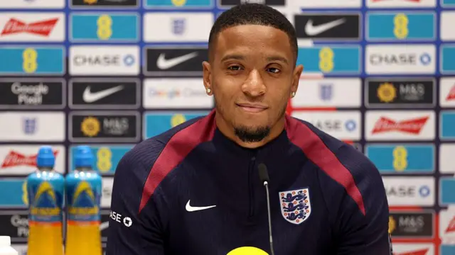 Ezri Konsa speaks to the media during an England news conference