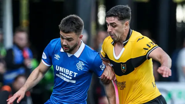 Rangers' Nicolas Raskin and Livingston's Andy Winter