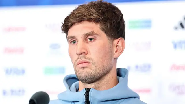 John Stones in a news conference
