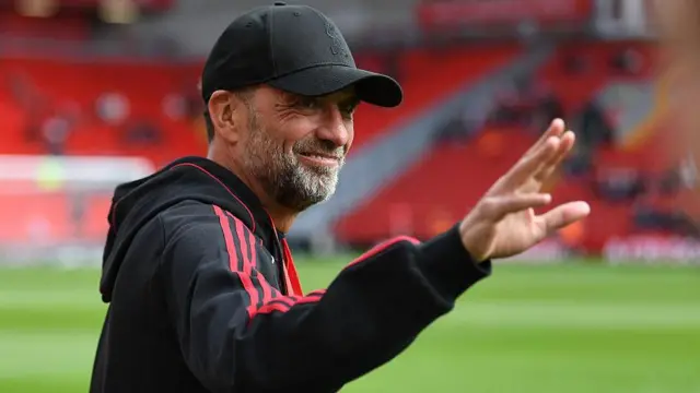 Jurgen Klopp waves to Liverpool fans