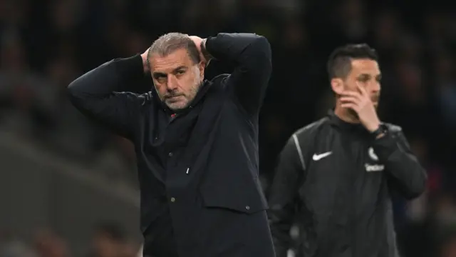 Ange Postecoglou has head in hands