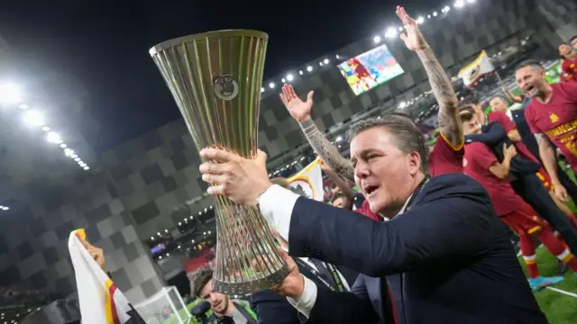 AS Roma President Dan Friedkin poses with trophy after the 2022 UEFA Conference League win