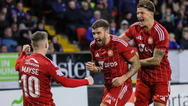 Steven McCullough celebrates goal