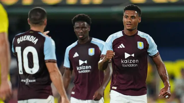 Villa players celebrating after scoring 