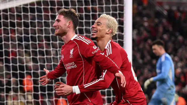 Alexis Mac Allister and Hugo Ekitike celebrating