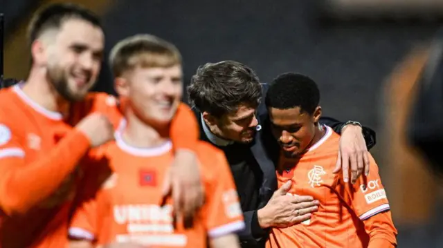 Rangers head coach Danny Rohl congratulates his players against Dundee