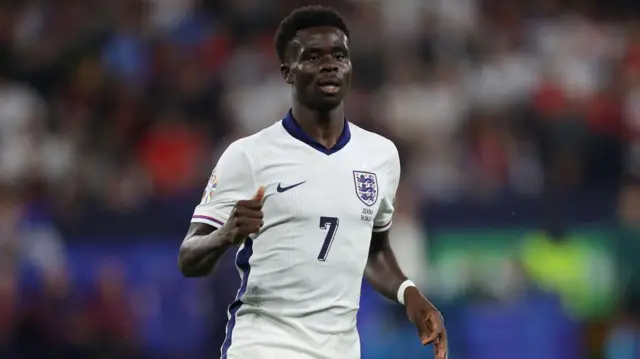 Bukayo Saka in action for England