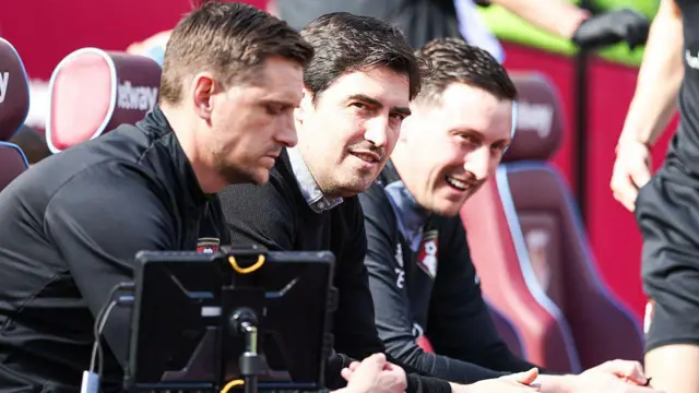 Andoni Iraola with his coaching staff on the Bournemouth bench