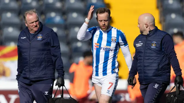 Rory McKenzie goes off injured 
