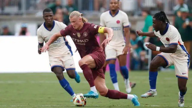 Erling Haaland goes for the ball