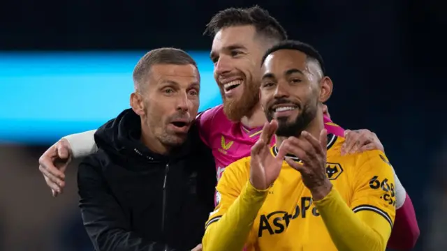 Gary O'Neil, Manager of Wolverhampton Wanderers, celebrates with Jose Sa and Matheus Cunha