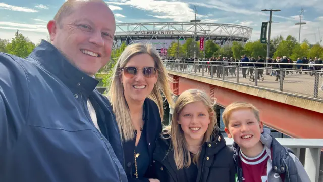 A selfie of a family outside London Stadium