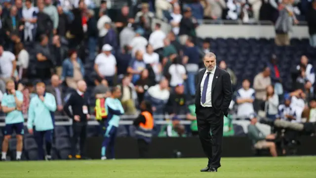 Ange Postecoglou looks dejected