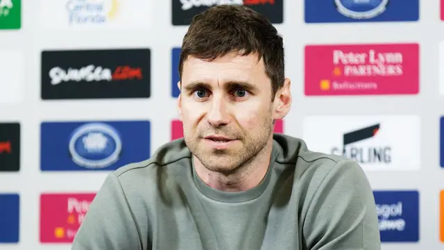 Richard Montague speaks at a press conference