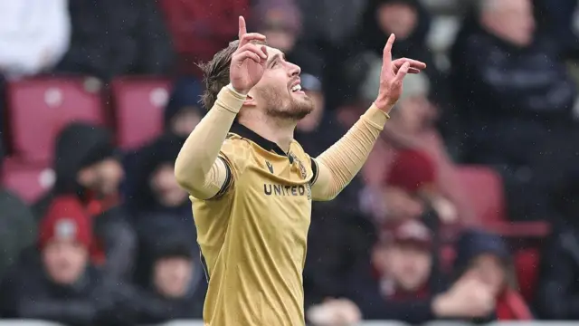 Sam Smith celebrates his goal against Northampton