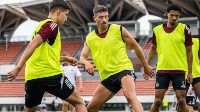 Newcastle players training in Japan