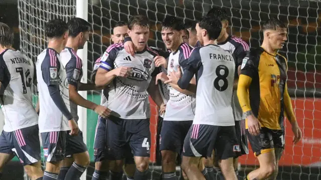 Exeter City captain Ed Turns celebrates his winning goal against Newport