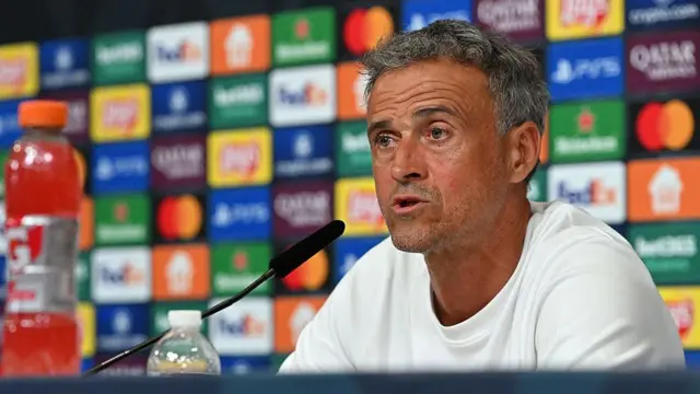  Luis Enrique speaks to the media during his Paris Saint-Germain press conference before Wednesday's Super Cup against Spurs