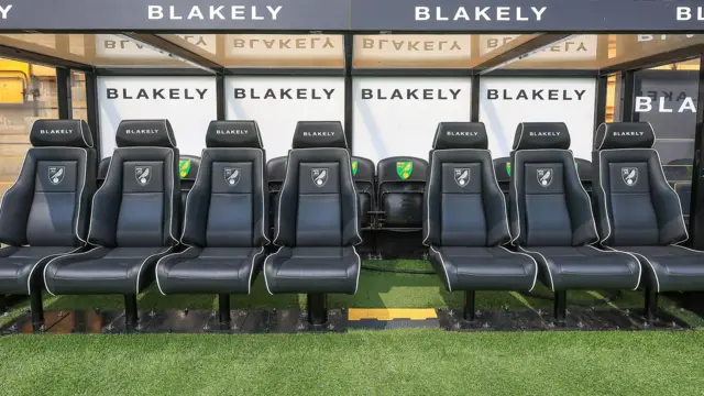 The empty home dugout inside Carrow Road