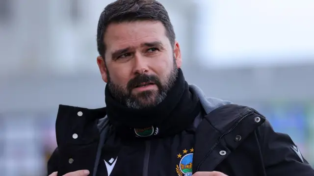 David Healy watches his Linfield team in action against Glenavon