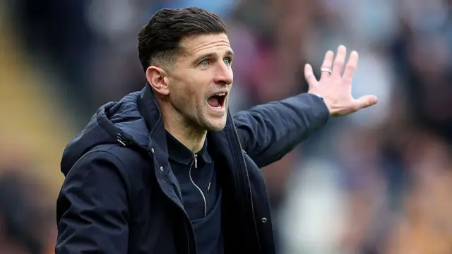 Portsmouth boss John Mousinho shouts from the sidelines