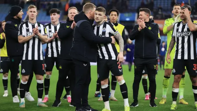 Eddie Howe hugs Kieran Trippier