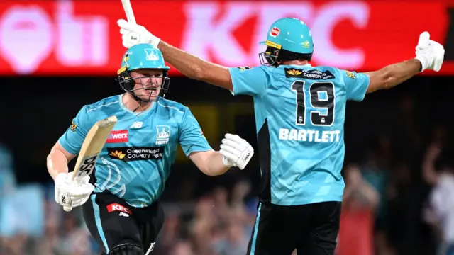 Max Bryant and Xavier Bartlett celebrate Brisbane Heat's win over Melbourne Stars in the Big Bash League
