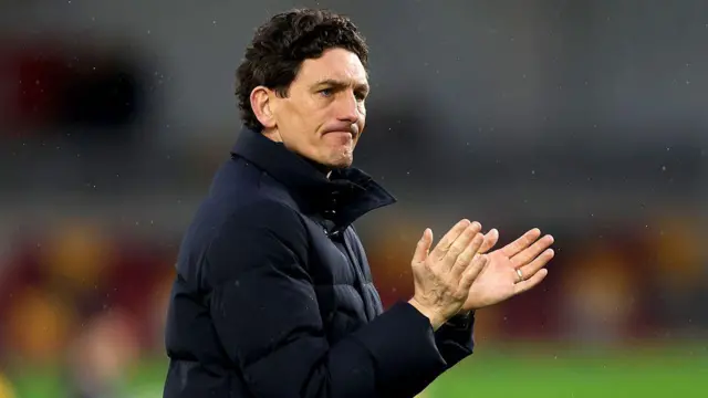 Keith Andrews applauds the Brentford fans following the Bees' 2-0 home defeat to Brighton in the Premier League