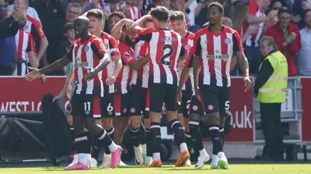 Brentford players celebrate a goal