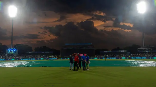 Match officials confer as rain delays play during match 12 of the Betway SA20 season 4 between Pretoria Capitals (PC) and Durban Super Giants (DSG) held at the Supersport Park Stadium in Centurion, South Africa