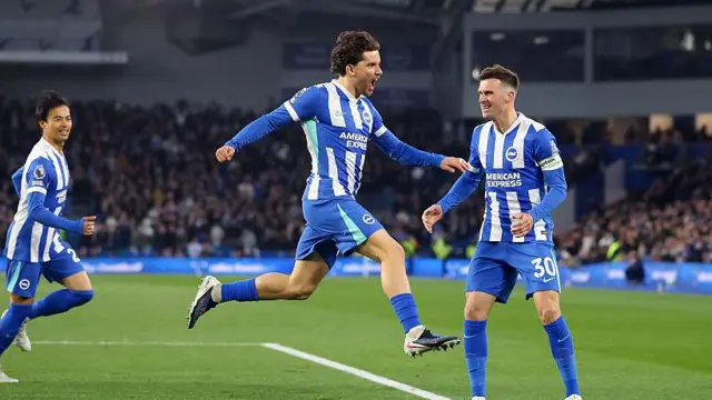 Ferdi Kadioglu of Brighton & Hove Albion celebrates scoring