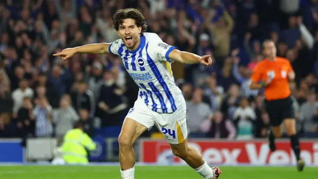 Ferdi Kadioglu of Brighton & Hove Albion celebrates scoring his team's third goal during the Carabao Cup Third Round match between Brighton & Hove Albion and Wolverhampton Wanderers at Amex Stadium