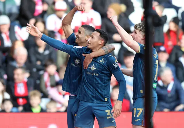 Kyle Naughton, Ronald and Przemyslaw Placheta celebrate a Swansea goal at Sunderland