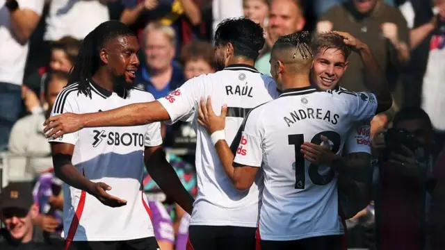 Emile Smith Rowe of Fulham celebrates with team mates after scoring his team's second goal during the Premier League match between Fulham FC and Newcastle United FC at Craven Cottage