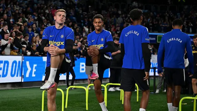 Liam Delap and Mahdi Nicoll-Jazuli warm up before a Chelsea game