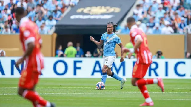 Nathan Ake dribbles with the ball