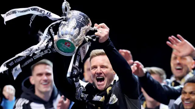 Eddie Howe, Manager of Newcastle United, celebrates with the Carabao Cup Trophy