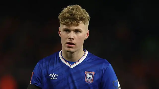 Sindre Walle Egeli in an a blue Ipswich Town shirt