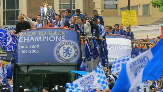 Chelsea captain John Terry and midfielder Frank Lampard hold the Premiership trophy aloft on an open-top bus