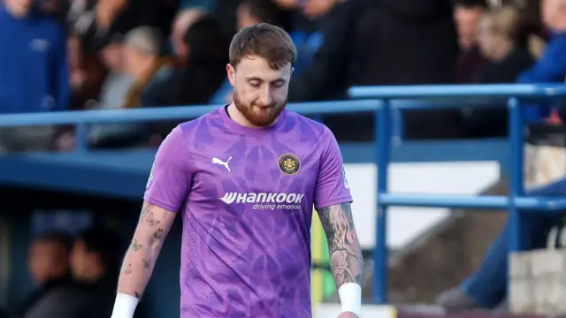 Nathan Gartside leaves the field after being sent off