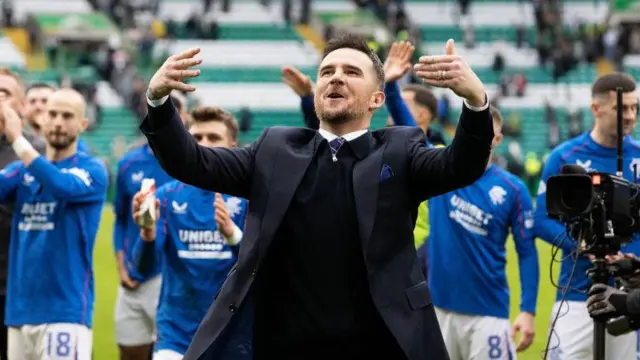 Rangers interim manager Barry Ferguson soaks up the adulation of the visiting fans at Celtic Park