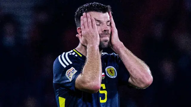 Grant Hanley conceded the penalty for Poland's injury-time winner