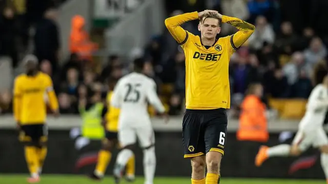 Wolves' David Moller Wolfe reacts after conceding a goal