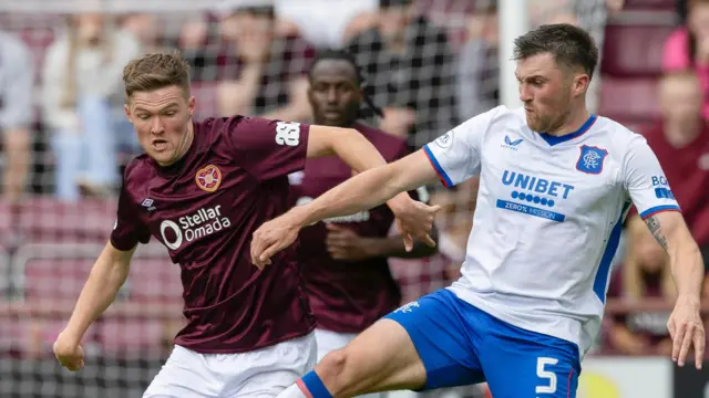 Hearts' Blair Spittal and Rangers' John Souttar