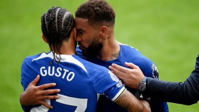 Reece James and Malo Gusto embrace