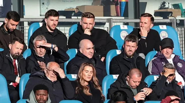 Michael Carrick sitting next to Manchester United chief executive Omar Berrada during the FA Youth Cup final defeat at Manchester City