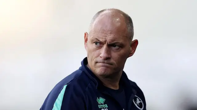 Millwall manager Alex Neil looks on from the touchline