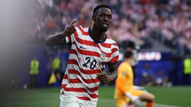 Folarin Balogun celebrates after scoring for USA against Paraguay at the World Cup