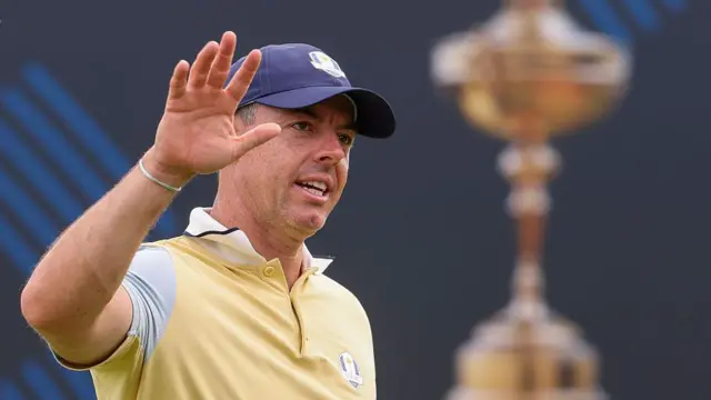 Rory McIlroy waves in front of the Ryder Cup