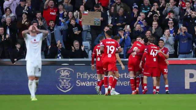 Ipswich players celebrate at Swansea in November